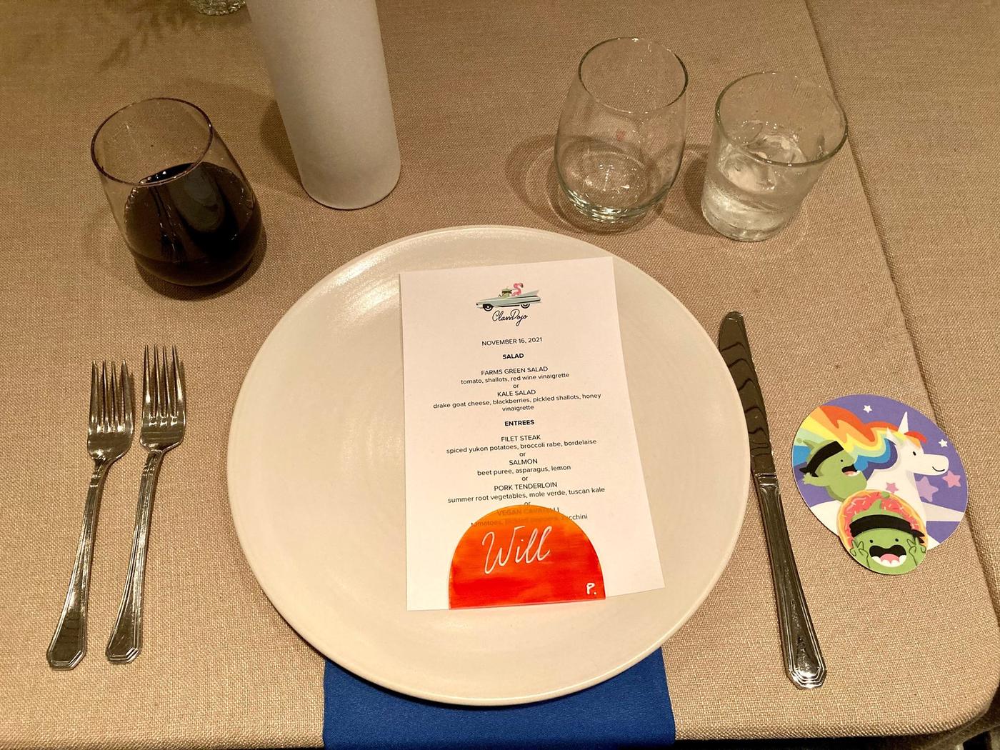 Dinner menu place setting with a custom acrylic place card