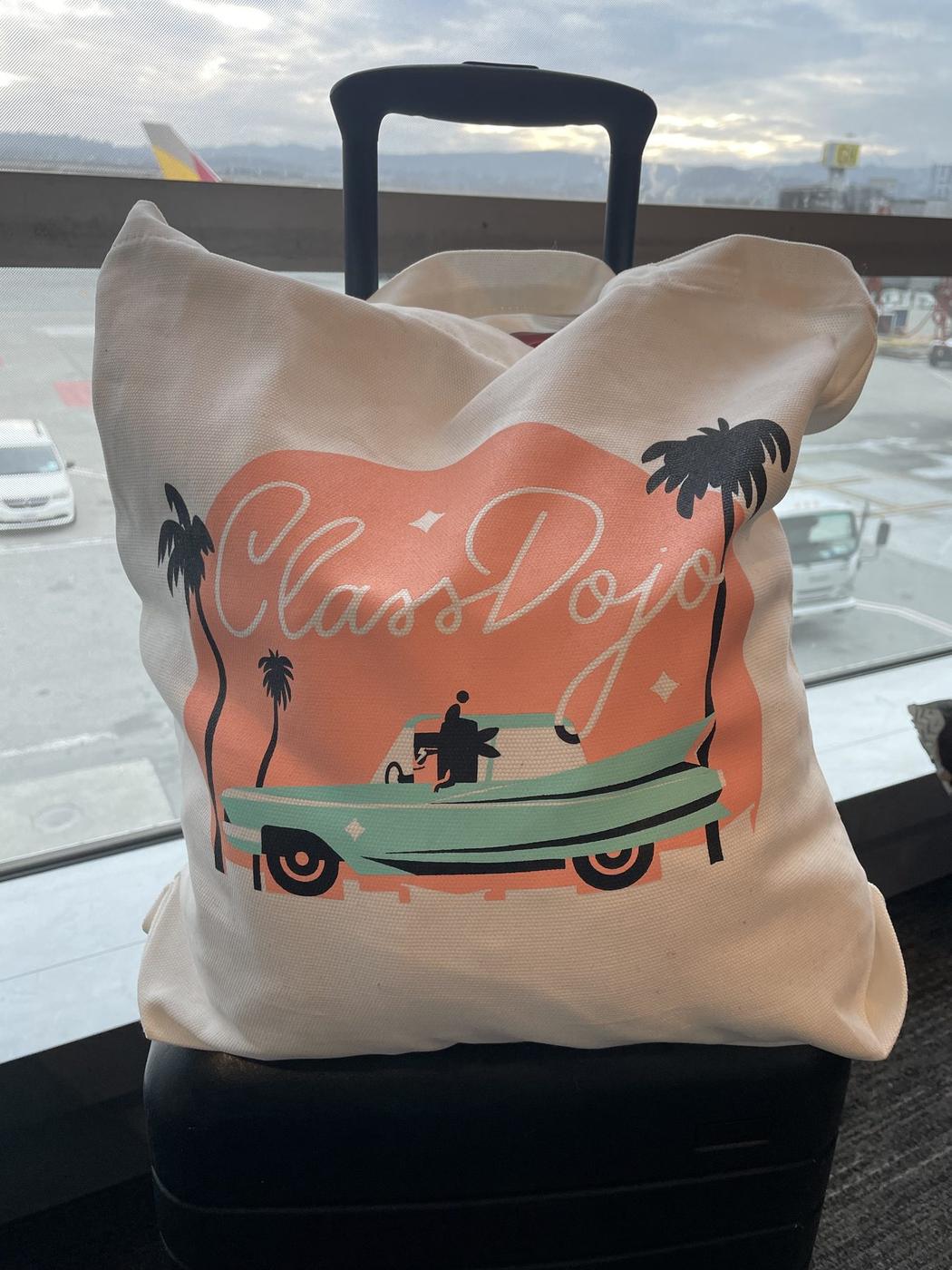 Custom illustrated tote bag with hand-lettered logotype